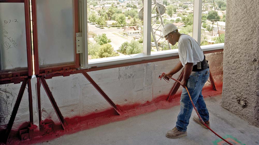 Insulators union contrator spraying firestopping material